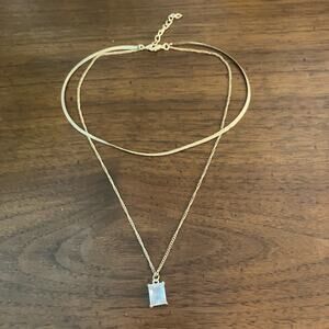 Gold choker double chain necklace with clear gem